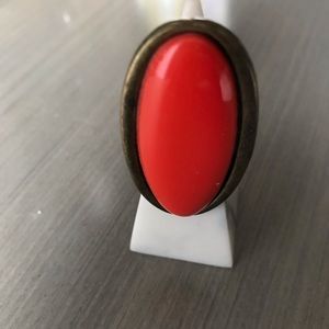 Orange red oval ring
